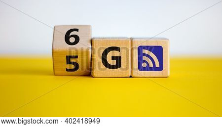 Time To 6g Symbol. Turned A Wooden Cube And Changed Sign 5g To 6g. Technology, Business, Network, Co