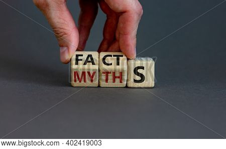 Facts Or Myths Symbol. Businessman Hand Turns Cubes And Changes The Word 'myths' To 'facts'. Beautif