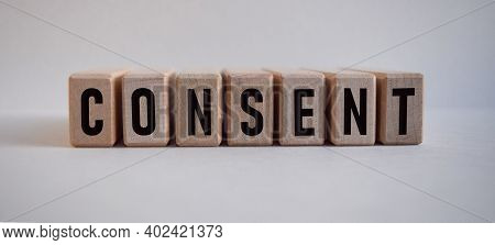 Word Consent, Inscription On Wooden Cubes On White Background