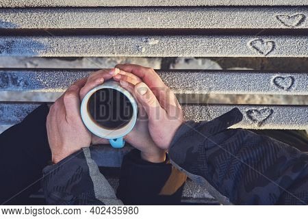 Couple Holding Cups Of Tea. Winter Walk In A Park. Light-blue Coffee Mug. Top View.