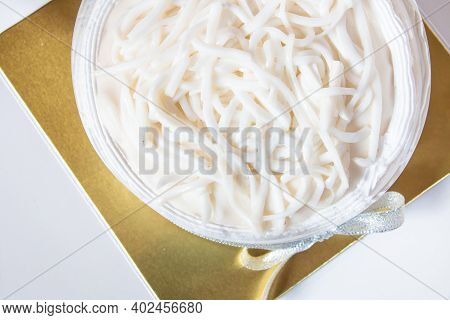 Piece Of Coconut Cake With Coconut Meat Layer On Topping Isolated On White Background.
Sliced Of Hom