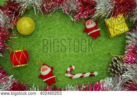 Christmas Gift Decorated With Green Branch, Pine Cone, Gift Bag Red And Silver Beads Garlans On Knit