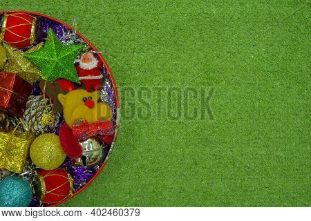 Christmas Gift Decorated With Green Branch, Pine Cone, Gift Bag Red And Silver Beads Garlans On Knit