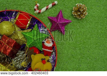 Christmas Gift Decorated With Green Branch, Pine Cone, Gift Bag Red And Silver Beads Garlans On Knit