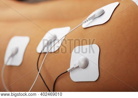 Myostimulation Procedure On The Legs Buttocks In A Beauty Salon.