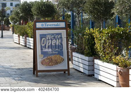 Limassol, Cyprus, January 8h, 2021: Outdoor Display Board Beside A Tavern Open Only For Delivery And