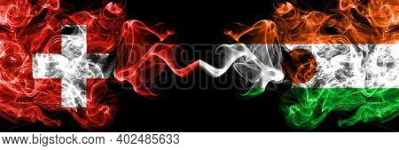 Switzerland, Swiss Vs Niger, Nigerien Smoky Mystic Flags Placed Side By Side. Thick Colored Silky Ab