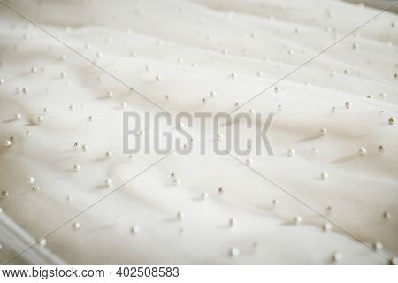 Texture Of The Wedding Dress. Wedding Dress Details. Close Up View.
