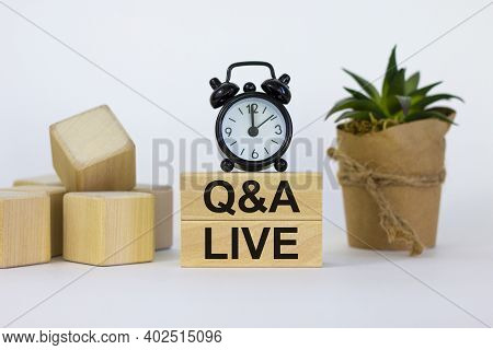 Q And A, Questions And Answers Live Symbol. Concept Words 'q And A Live' On Wooden Blocks On A Beaut
