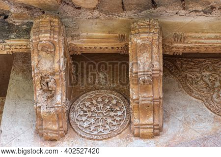Hampi, Karnataka, India - November 5, 2013: Zanana Enclosure. Closeup Of Decorated Brown Stone Studs