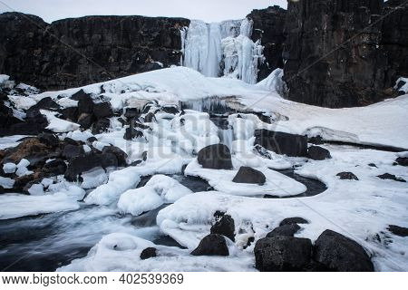 Winter Wonderland Panorama Of Frozen Waterfall Oxararfoss Oxara River Almannagja In Thingvellir Nati