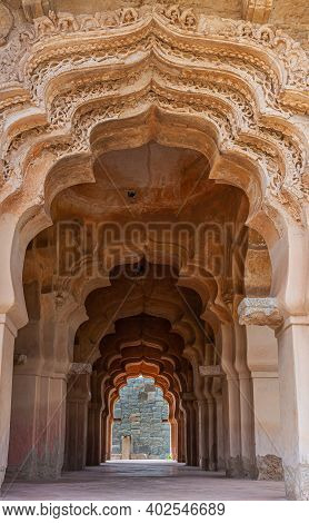 Hampi, Karnataka, India - November 5, 2013: Zanana Enclosure. Looking Through A Tunnel Of Arches In 