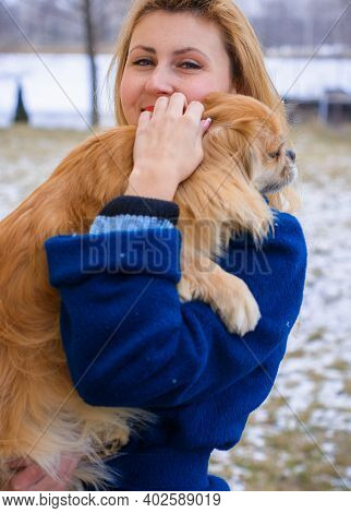 Nice Young Woman On A Walk With Her Dog Resting At Park. Best Friendship Girl And Senior Dog. Psycho