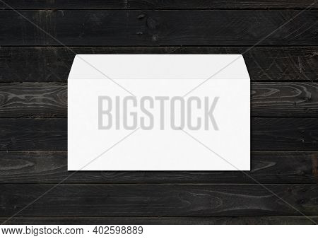 White Enveloppe Mockup Template Isolated On Black Wood Background