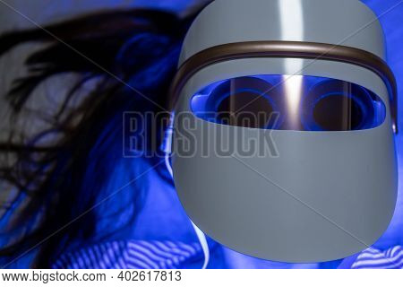 Woman With Blue Led Light Therapy Facial And Neck Beauty Mask Photon Therapy