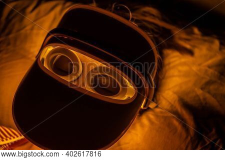 Woman With Yellow Led Light Therapy Facial And Neck Beauty Mask Photon Therapy