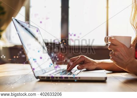 Woman Surfs In Internet With Her Laptop. She Work At Home As Smart Working