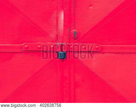 Red Industrial Metal Warehouse Door With Security Locked Latch Lock And Safety Lock Insert In Harden