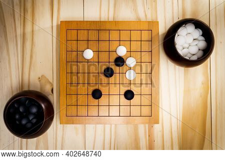 Go Game, Goban, Baduk Or Weiqi (chinese Board Game) Background