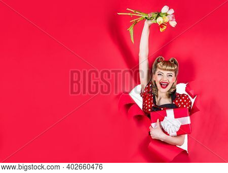 Advertising. Pin Up Girl With Flowers. Smiling Retro Woman Hold Flowers Through Hole In Paper. Woman