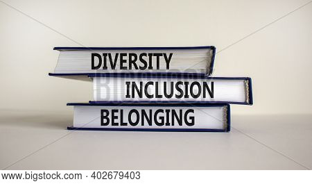 Diversity, Inclusion And Belonging Symbol. Books With Words 'diversity, Inclusion And Belonging' On 