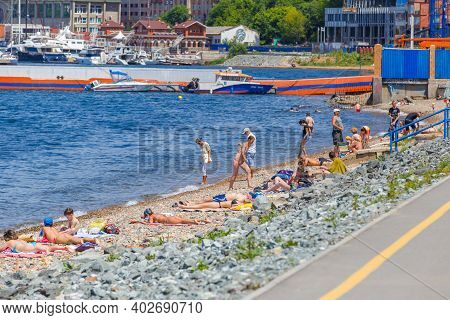 Summer, 2016 - Vladivostok, Russia - Water Area Of Fedorov Bay In Vladivostok. People Swim And Sunba