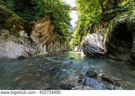 Small Quiet River In A Mountain Canyon