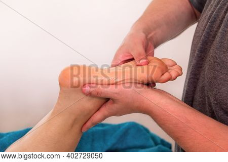 Massage Relax Studio. Toot Massage. Foot Massage In Spa Salon, Close Up. Woman Receives Leg Massage.