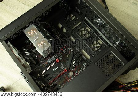 Moscow, Russia - 5 December 2020: Opened Computer Case, Pc Components. Msi Motherborad, Cpu Fan And 