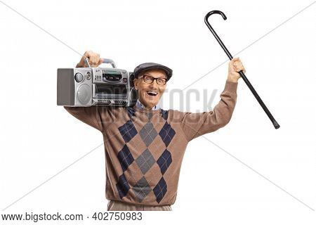 Full length portrait of a cheerful senior man with a boombox radio and a walking cane isolated on white abackground