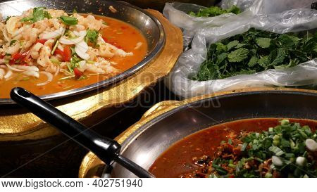 Bowls With Various Asian Dishes On Stall. Bowls Of Assorted Traditional Thai Dishes Placed On Stall 