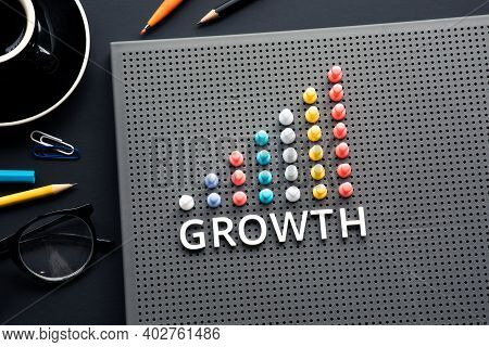 Growth Text With Pin Garph Chart On Business Table.vision To Success And Strategy Plan.