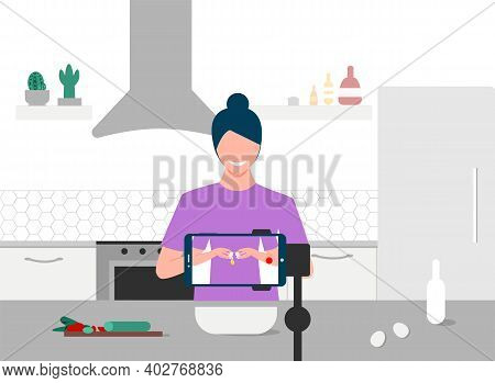 Food Blogger Streaming Live. A Smiling Woman Breaking An Egg And Records An Online Cooking Video Tut