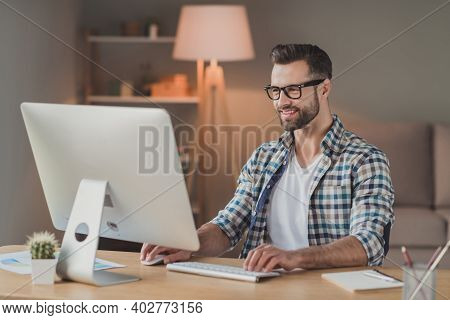 Photo Of Young Cheerful Handsome Man Happy Positive Smile Remote Work Computer Programmer Desk Indoo