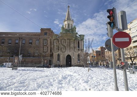 Madrid, Spain - January 10, 2021: Church Of Our Lady Of La Paz, Seen From O'donell Street, On A Snow