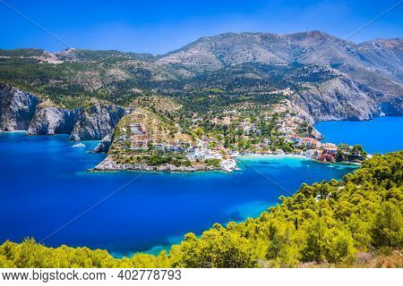 Kefalonia, Greece. Colorful Village Of Assos Seen From Assos Castle.
