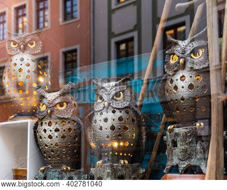 Zgorzelec Gorlitz January 27 2020 Metal Owls Lanterns At Shop Facade With Reflections In Window