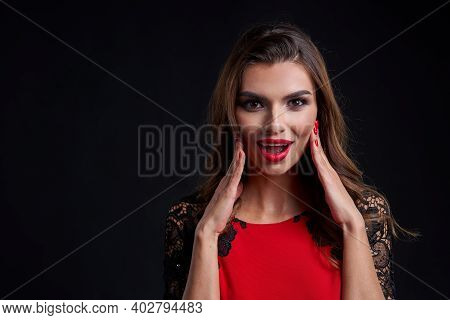 Closeup Of Excited Surprised Gorgeous Woman In Party Dress And Red Lips Makeup Looking At Camera Sho