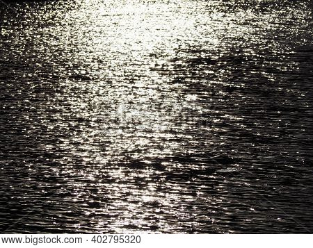 Abstract Background Texture With Silver Glitter Water