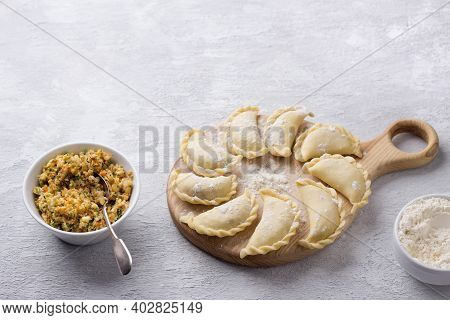 Homemade Raw Frozen Vegan Dumplings, Vareniki, Pierogi, Kreplach  Stuffed With Vegan Lentil 