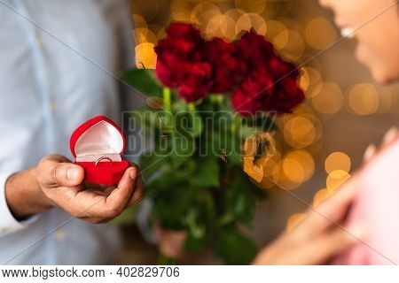 Will You Marry Me. Closeup Of Unrecognozable African American Man Showing Open Box, Offering Marriag