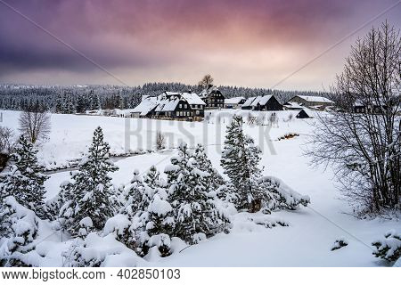 Winter In Jizera Mountains. Cloudy Evening In Jizerka Village, Czech Republic