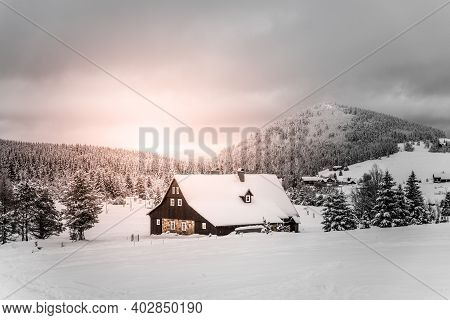 Winter In Jizera Mountains. Cloudy Evening In Jizerka Village, Czech Republic