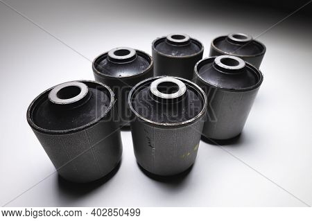Close-up Wide Angle. A Group Of Cylindrical Silent Blocks For The Rear Suspension Of An Off-road Veh
