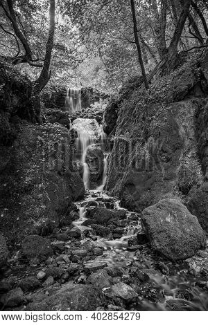 Long Exposure Clampitt Falls Waterfall At Canonteign Falls In Dartmoor