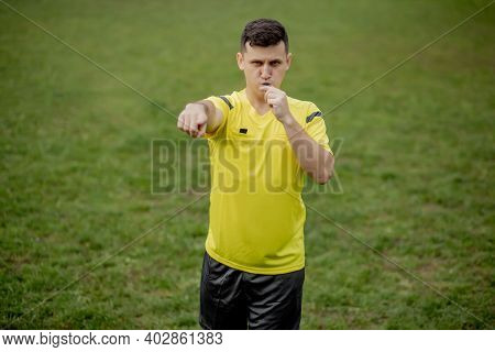 Referee Indicates A Violation Of The Rules. Concept Of Sport, Rules Violation, Controversial Issues,