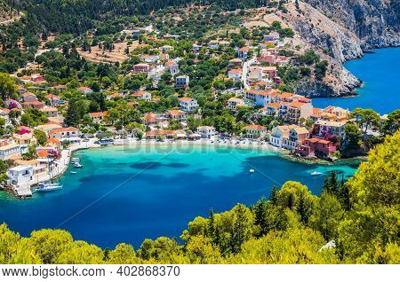 Kefalonia, Greece. Colorful Village Of Assos Seen From Assos Castle.