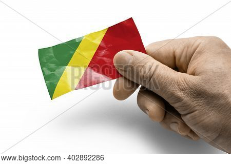 Hand Holding A Card With A National Flag The Congo