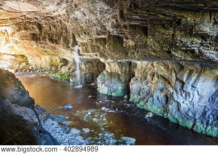 Moria Gate Arch, Karamea, New Zealand. Unusual natural landscapes.