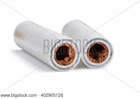 Old Broken Sludge Plumbing Polypropylene Pipes With Red Rust And Limescale. Corrosion, Sludge And Ha